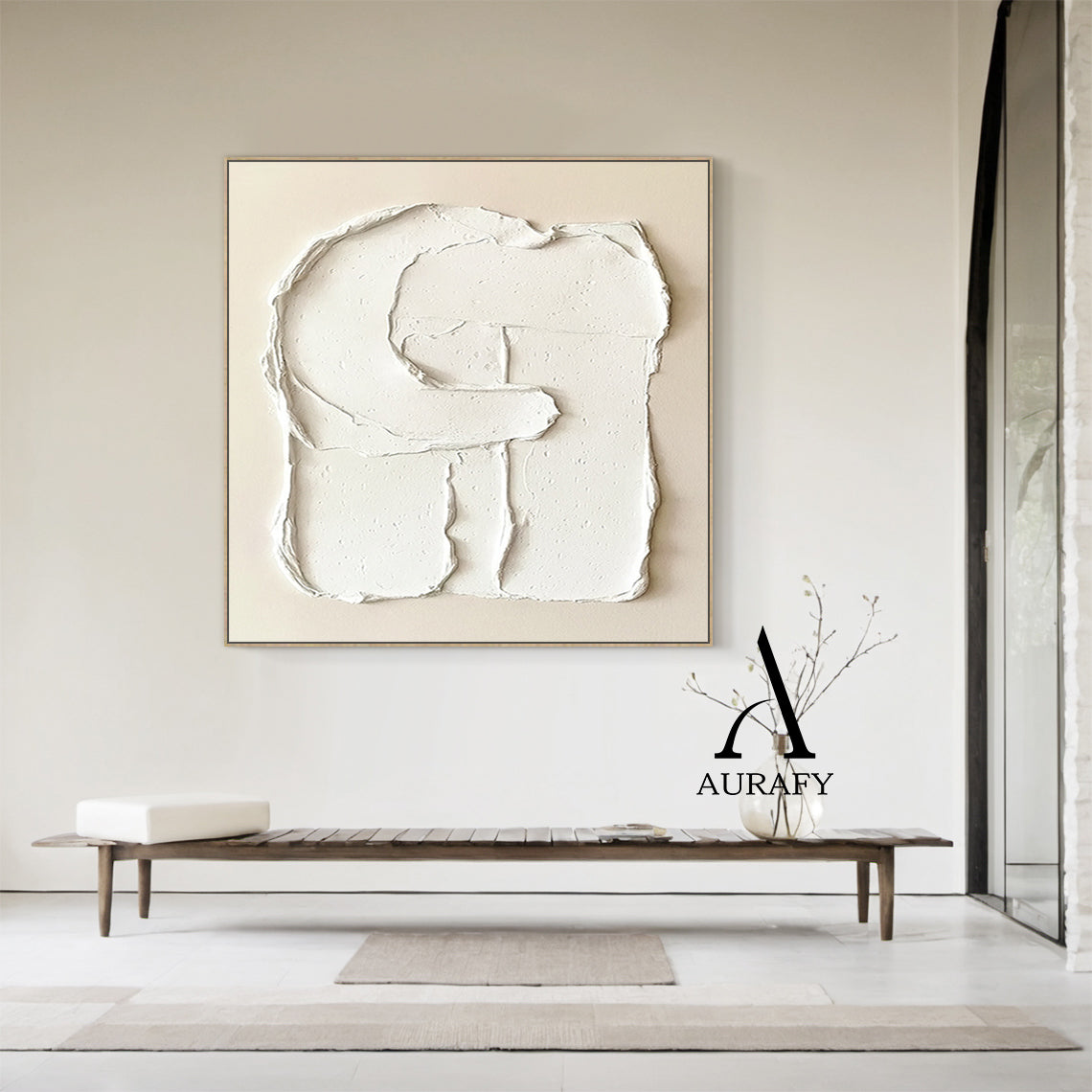 Aurafy AURA541 minimalist plaster textured wall art, warm soft beige canvas base with hand-applied thick impasto matte white 3D abstract capital letter G shape, with irregular handcrafted rough edges, natural porous surface details and texture folds, neutral tone wabi sabi japandi wall decor for modern minimalist home.