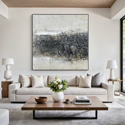 Abstract Black White Art with Crackle Texture (AURA219) | Modern Abstract Minimalist Luxe Wall Decor. Features thick knife strokes, tactile plaster finish, 3D impasto, and subtle light gold/beige undertones. Ideal for Japandi living room focal point, modern bedroom wall art, home office decor, or above sofa/console table. Balances deep black, soft off-white & gray with intentional crackle texture (wabi-sabi influences). Framed vertical abstract piece with strong light-dark contrast and layered, textured sur