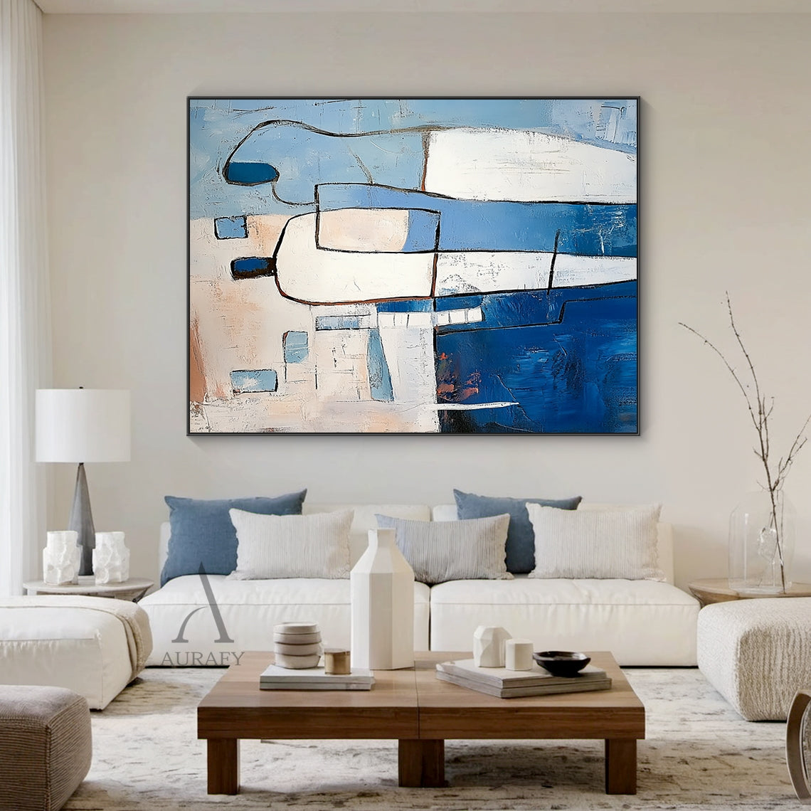 Modern Abstract Blue Art (AURA405) Living Room Scenario Display, the artwork comes with expressive tactile impasto texture, bold outlines defining two faceless stylized abstract human figures: the left figure has white upper body and deep navy lower half, the right figure presents soft light blue and white curved forms, the artwork's base background is spliced with light blue and beige geometric blocks with subtle pale orange warm accents, handcrafted brushstrokes create a dimensional 3D paint surface. This
