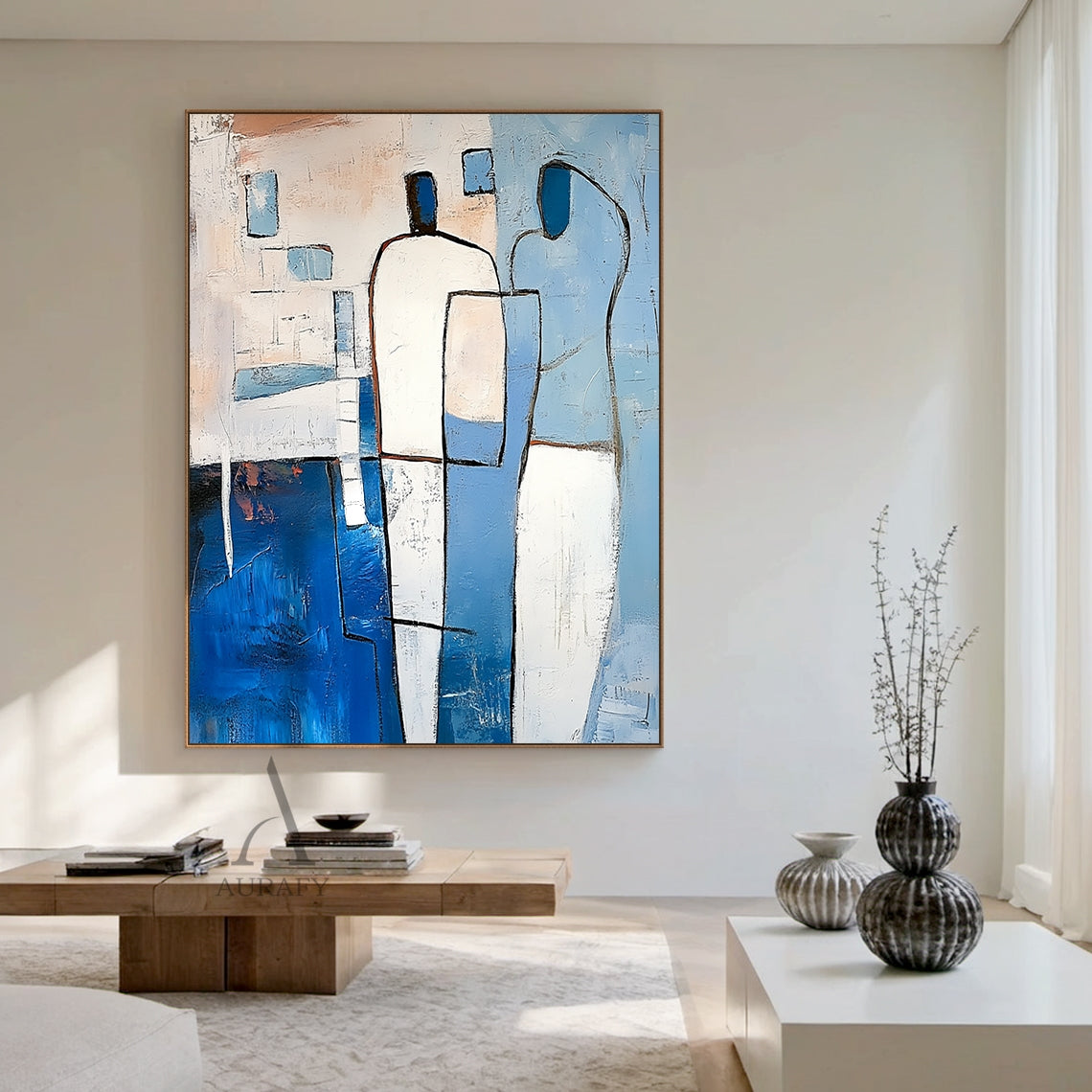 Modern Abstract Blue Art (AURA405) with expressive tactile impasto texture, bold outlines defining two faceless stylized abstract human figures. Left figure has white upper body and deep navy lower half, right figure features soft light blue and white curved forms. Background includes light blue, beige geometric blocks with subtle pale orange warm accents, handcrafted brushstrokes create dimensional 3D paint surface, perfect for minimalist, Japandi, modern living room, bedroom and office decor.