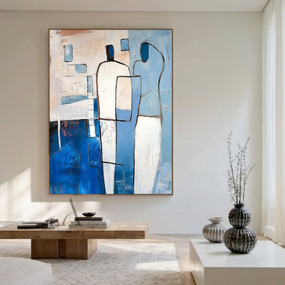 Modern Abstract Blue Art (AURA405) with expressive tactile impasto texture, bold outlines defining two faceless stylized abstract human figures. Left figure has white upper body and deep navy lower half, right figure features soft light blue and white curved forms. Background includes light blue, beige geometric blocks with subtle pale orange warm accents, handcrafted brushstrokes create dimensional 3D paint surface, perfect for minimalist, Japandi, modern living room, bedroom and office decor.