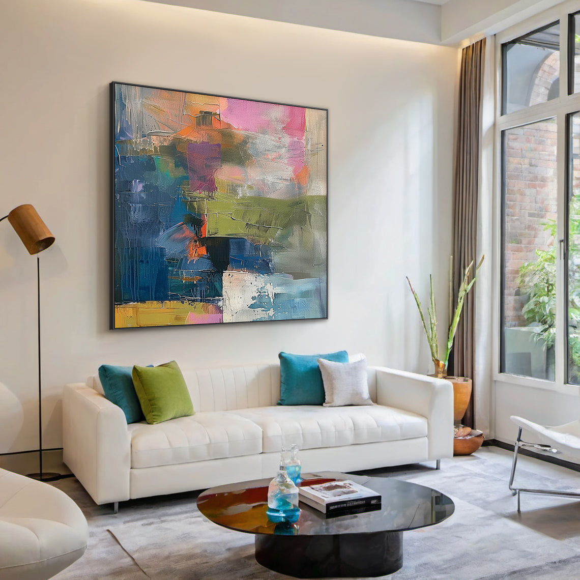 Large contemporary abstract canvas wall art with thick textured brushstrokes—dominant deep blue paired with pink, olive green, mustard yellow, white, and orange. Displayed as an eye-catching centerpiece in a sleek modern bedroom, this statement piece complements minimalist, eclectic, or modern interiors. Ideal for urban homes and apartments, adding dynamic visual depth and artistic flair to bedrooms, reading nooks, or home offices. Ready-to-hang with pre-installed hardware, it turns any space into a lively,