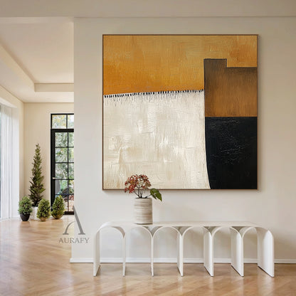 AURA641 Abstract Brown Beige Wall Art, modern organic abstract painting with impasto thick tactile brush strokes. Features large warm amber brown top block, vertical soft beige left block, dark brown and deep black geometric blocks on the right, with delicate black tassel-style short brush strokes as detail between brown and beige areas. All color blocks have visible hand-painted brush textures, earthy neutral palette, ideal for Japandi minimalist home decor.
