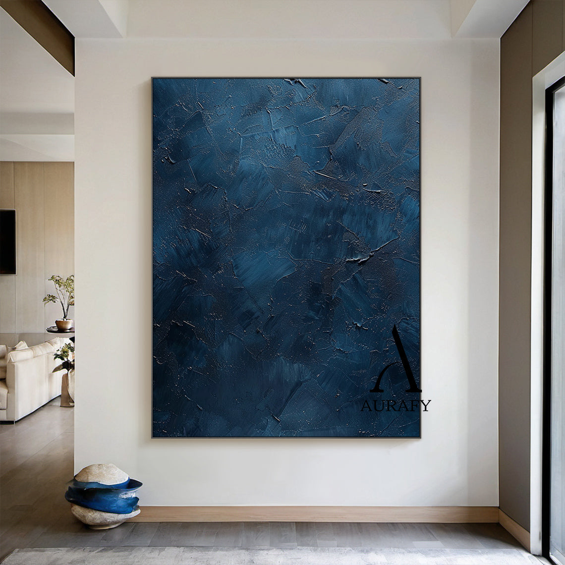 Handcrafted navy blue abstract minimalist canvas wall art, featuring thick hand-applied impasto palette knife textured surface with irregular raised scrapes, subtle metallic shimmer flecks, layered muted blue shades ranging from soft slate blue to deep midnight navy, no figurative patterns, wabi-sabi Japandi style artwork from Aurafy, ideal for modern minimalist, wabi-sabi, Japandi interior wall decor.