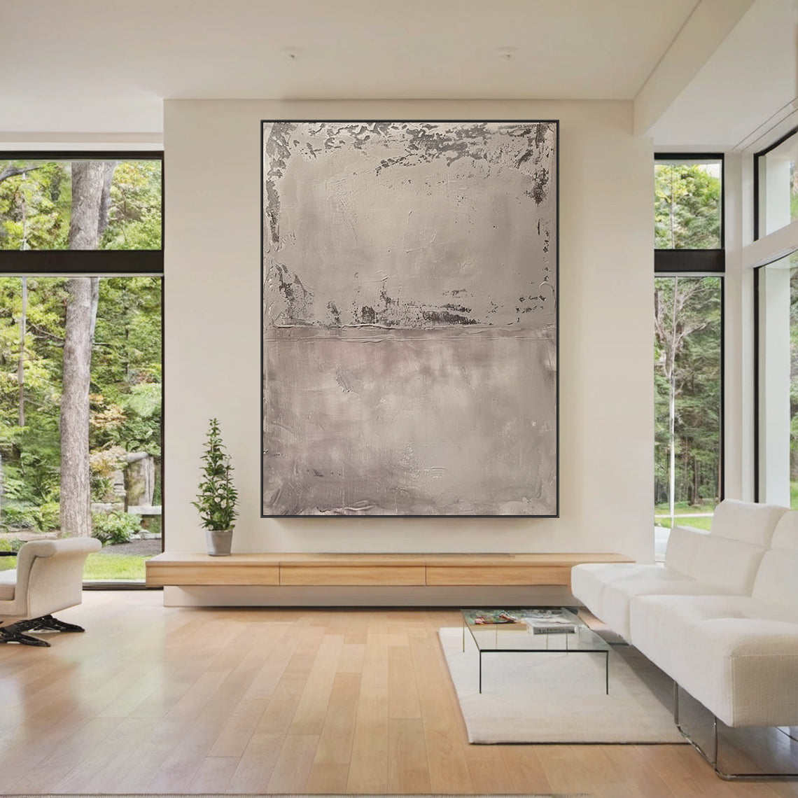 Wabi Sabi Abstract Tactile Impasto Gray Wall Art with Muted Pink Undertones & Distressed Surface (AURA191) - A warm focal point in a cozy bohemian bedroom. Features layered impasto texture, weathered patterns, soft silvery grays to deep charcoal, subtle pink hints. Displayed above a warm wooden bed frame with beige linen bedding, complementing woven macramé wall hangings, a potted fiddle leaf fig in the corner, and soft ambient light from a ceramic table lamp. Ideal for bohemian, organic home decor.
