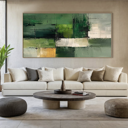 Wabi Sabi Abstract Geometric Canvas Wall Art: Hand-applied textured brushstrokes in shades of green (olive, sage, forest), cream, and gold accents. Rough, raised tactile surface with cross grid lines, ideal for minimalist living room, bedroom, or entryway decor. Complements neutral earthy interiors, adding calm organic charm and dynamic depth as light catches the textured details. Slim black frame included, enhancing the natural, imperfect beauty of the piece. Suitable for those seeking nature-inspired sere