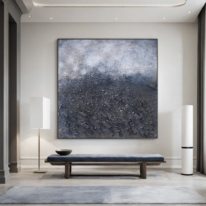 Wabi Sabi Abstract Plaster Textured High-Relief Canvas Art (AURA218) | Gray-Blue Gradient with Subtle Pink Accents | Ideal for Wabi-Sabi Style Dining Room Focal Wall, Modern Nordic Entryway Decor, or Minimalist Study Desk Backdrop. Boasts rough organic texture (thick paint mixed with gravel) for a tactile, naturally imperfect feel, harmonizing with contemporary rustic and minimalist interiors.