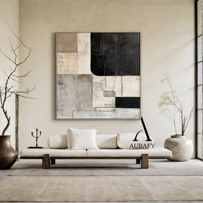Wabi Sabi Abstract Wall Art (AURA566 by Aurafy) - Displayed in a serene Japandi living room setting: mounted on a light beige wall above a natural wood console table, featuring tactile scratch texture, overlapping curved-edge geometric blocks (black, beige, gray), handcrafted imperfections & 3D layered surface. Complementing natural wood accents and linen textiles, it adds a calm organic vibe—ideal as a focal point for Japandi decor, minimalist bedrooms, small spaces or above console tables. Muted earth ton