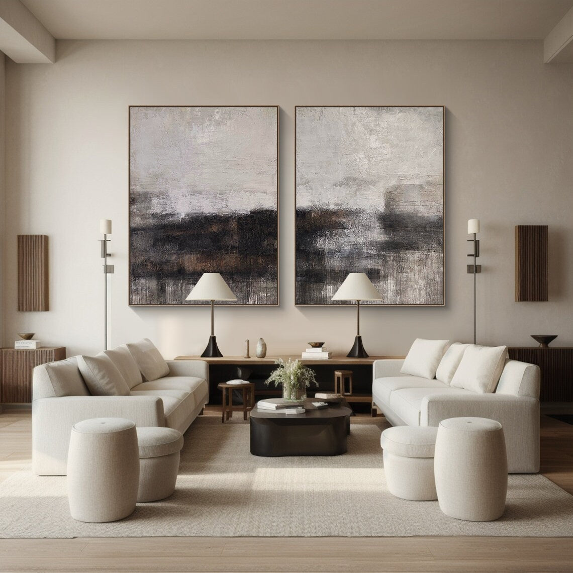 Two-piece Wabi Sabi abstract art set hanging above a beige linen sofa in a modern Japandi living room. Each canvas features tactile knife strokes, warm neutral tones (soft beige, deep charcoal, earthy brown) with subtle pink undertones, and intentional imperfect textures. The space includes a wooden glass coffee table, woven rug, and minimalist decor—ideal for creating a serene, natural-inspired living space.