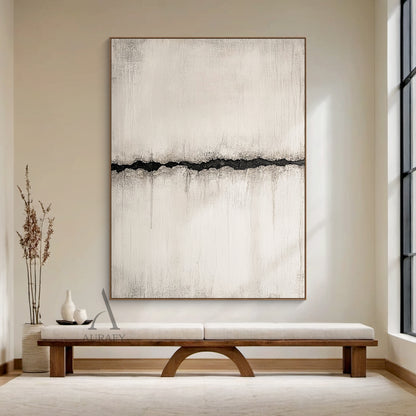 Wabi Sabi beige abstract textured canvas wall art in real home scene display, features muted warm off-white plaster-like base with vertical rough brush stroke impasto texture and subtle distressed weathered finish, a single irregular jagged deep black fissure with faded charcoal grey smudged edges runs horizontally across the center, minimalist Japandi style neutral abstract wall decor perfect for matching wabi sabi, Japandi, minimalist, quiet luxury interior spaces.