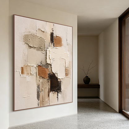 Wabi-sabi Japandi minimalist 3D textured abstract painting displayed on the soft off-white accent wall of a light oak Japandi living room, handcrafted with thick impasto techniques, features irregular geometric paint blocks in soft muted earth tones: warm beige, creamy off-white, rustic terracotta brown, deep chocolate brown, and understated cool gray. The artwork boasts mixed tactile textures of rough granular gritty patches, smooth raised palette knife strokes, and natural uneven cracked paint edges, brin