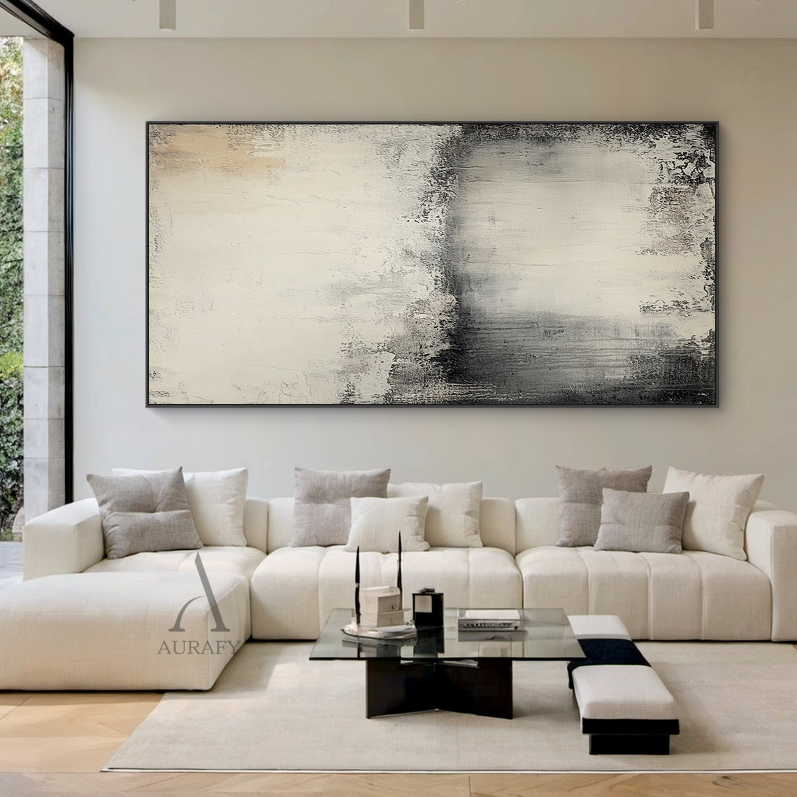 Wabi Sabi Beige General Abstract Plaster Textured Canvas Wall Art AURA720 (Home Decor Scene Display), features soft muted neutral palette with warm beige, creamy off-white, blended charcoal gray and deep black gradient transitions, hand-applied impasto finish with distressed worn edges, subtle vertical paint drips, rough brushed striations and uneven peeling-like surface details, non-directional minimalist abstract artwork presented in actual residential space, perfect for Japandi, Scandi, modern organic ho
