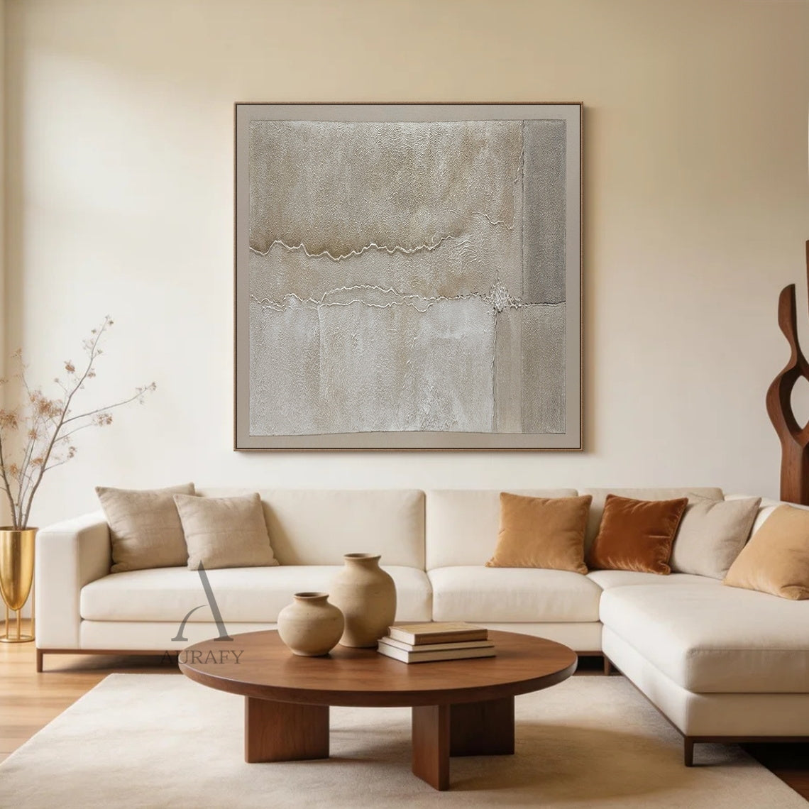 Wabi-Sabi beige plaster textured abstract canvas wall art (AURA735), horizontal landscape orientation. Features a full muted warm earth tone palette of light tan beige, cream off-white, grey beige and soft taupe. Hand-applied 3D impasto surface has two undulating raised horizontal ridges dividing the canvas into 3 sections with varying granular texture, plus vertical straight split blocks and small raised texture accents on the right, mimicking natural tidal traces, weathered rock and shoreline erosion visu
