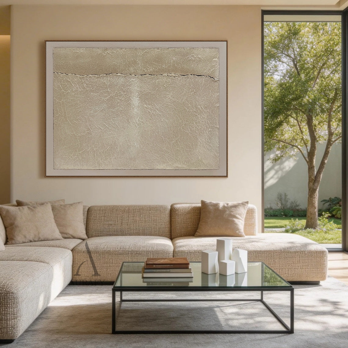 Wabi-Sabi Beige Handmade Textured Abstract Canvas Wall Art AURA734. Horizontal general abstract artwork with warm beige grainy impasto central panel, natural fine crackle textures across the surface, a thin irregular dark horizontal crack splitting the panel, bordered by soft pale off-white smooth frame. Neutral tactile Japandi minimalist wall decor for calm curated residential spaces.