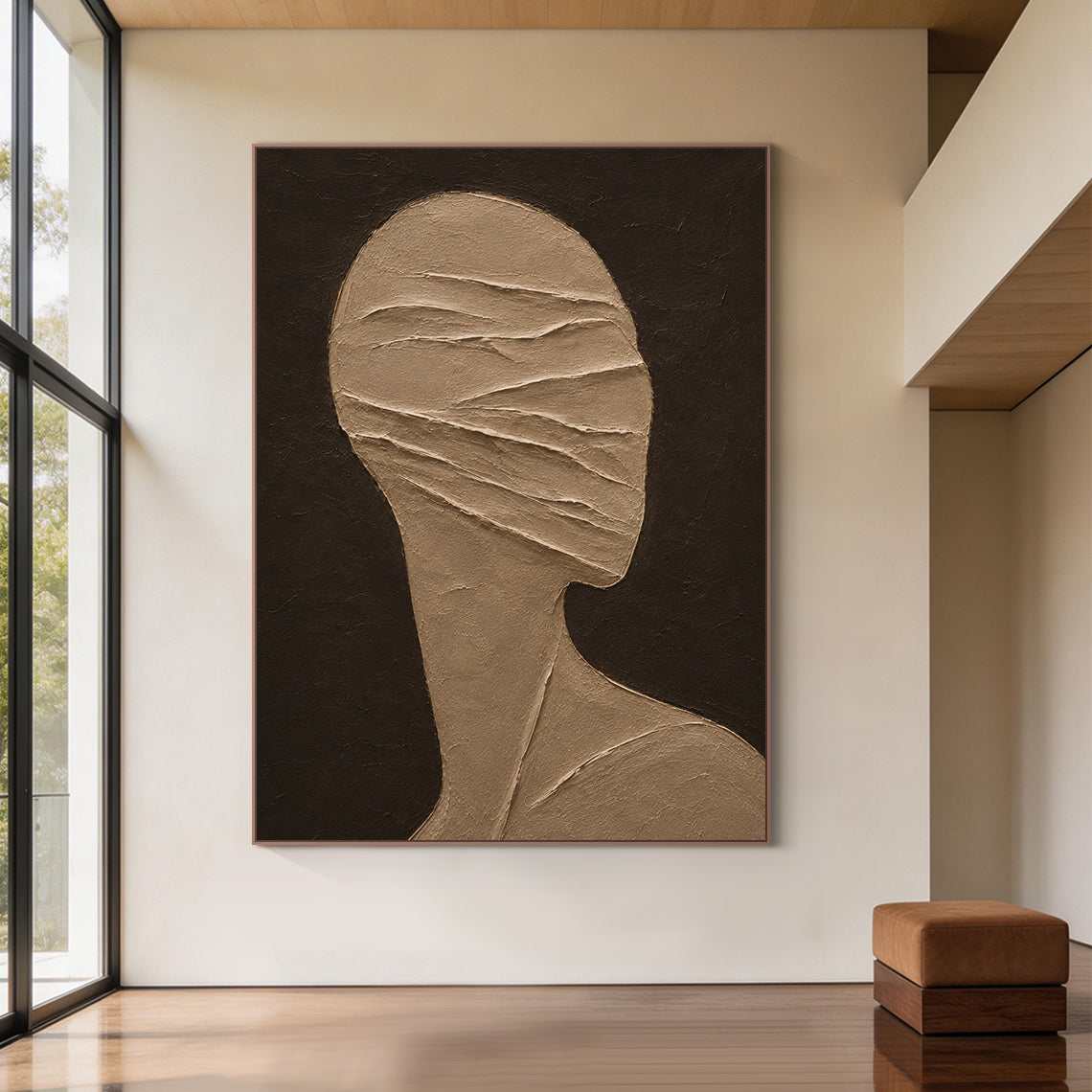 Wabi-Sabi brown 3D textured plaster abstract figure wall art AURA705, displayed in real japandi style living space, dark deep brown matte textured background, warm taupe stylized faceless head and shoulder side silhouette, raised diagonal impasto ridges wrapping across the face area like bandages, hand-applied thick high-relief tactile texture, perfectly matches minimalist earthy tone home interior decoration.