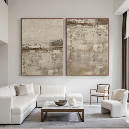 AURA227 Wabi Sabi Brown Abstract Wall Art Two-Piece Set—textured canvas with warm earthy tones (soft beige, rich brown, subtle gray) embodying organic imperfection. Displayed in a vibrant bohemian-style living room with rattan armchairs, macramé wall hangings, terracotta planters, and a plush mustard throw. Ideal for bohemian interior decor or eclectic living spaces, infusing natural warmth and understated elegance into lively yet serene environments. This two-piece abstract art set elevates the room's cozy
