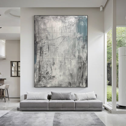 AURA224 Wabi Sabi Gray Abstract Textured Canvas Wall Art - Large statement piece with layered tactile brushstrokes, muted grays, and subtle teal accents, displayed above a light wood platform bed in a bright Scandinavian bedroom. Soft natural light filters through sheer white curtains, complementing neutral linen bedding and minimalist wooden nightstands with potted succulents. Ideal focal point for serene contemporary bedrooms, enhancing neutral wall decor with organic, tactile charm.