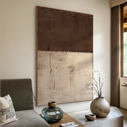 Hand-painted wabi-sabi abstract canvas painting, horizontal two-tone earth tone color blocking wall decor displayed in a warm cozy linen-decorated Japandi bedroom scene: upper area is low-saturation deep brown with clear vertical knife-scraped textured traces, lower area is soft muted beige with worn mottled impasto texture, natural paint drip detail presented on the right side, rough raw uneven edge between two color blocks, minimalist abstract artwork suitable for Japandi, neutral minimalist, wabi-sabi st