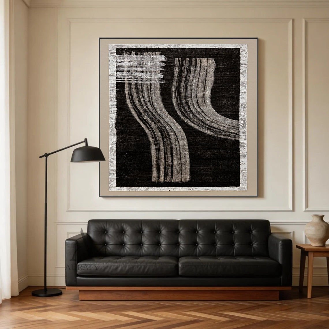 Wabi-Sabi black gray abstract textured wall art displayed in warm light-wood Japandi dining scene, handcrafted on rough woven canvas with raw off-white frayed border. Boasts deep black backdrop, horizontal gray brush stroke blocks at upper left, two groups of soft flowing curved gray draping linear strokes with natural hand-painted texture, this minimalist monochrome Japandi artwork is perfect for dining room, study and corridor warm neutral interior decor.