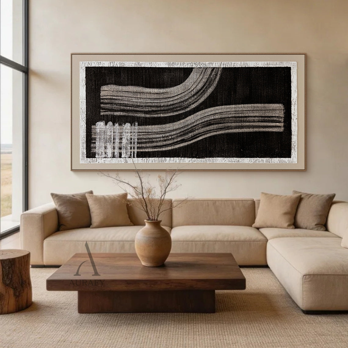 Wabi-Sabi black gray abstract textured wall art displayed in warm light-wood Japandi dining scene, handcrafted on rough woven canvas with raw off-white frayed border. Boasts deep black backdrop, horizontal gray brush stroke blocks at upper left, two groups of soft flowing curved gray draping linear strokes with natural hand-painted texture, this minimalist monochrome Japandi artwork is perfect for dining room, study and corridor warm neutral interior decor.