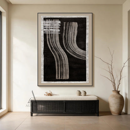 Wabi-Sabi black gray abstract textured wall art, handcrafted on rough woven canvas with raw off-white frayed border. Features deep black backdrop, horizontal gray brush stroke blocks at upper left, two groups of soft flowing curved gray draping linear strokes with natural hand-painted texture, minimalist Japandi monochrome artwork for neutral home interior decor.