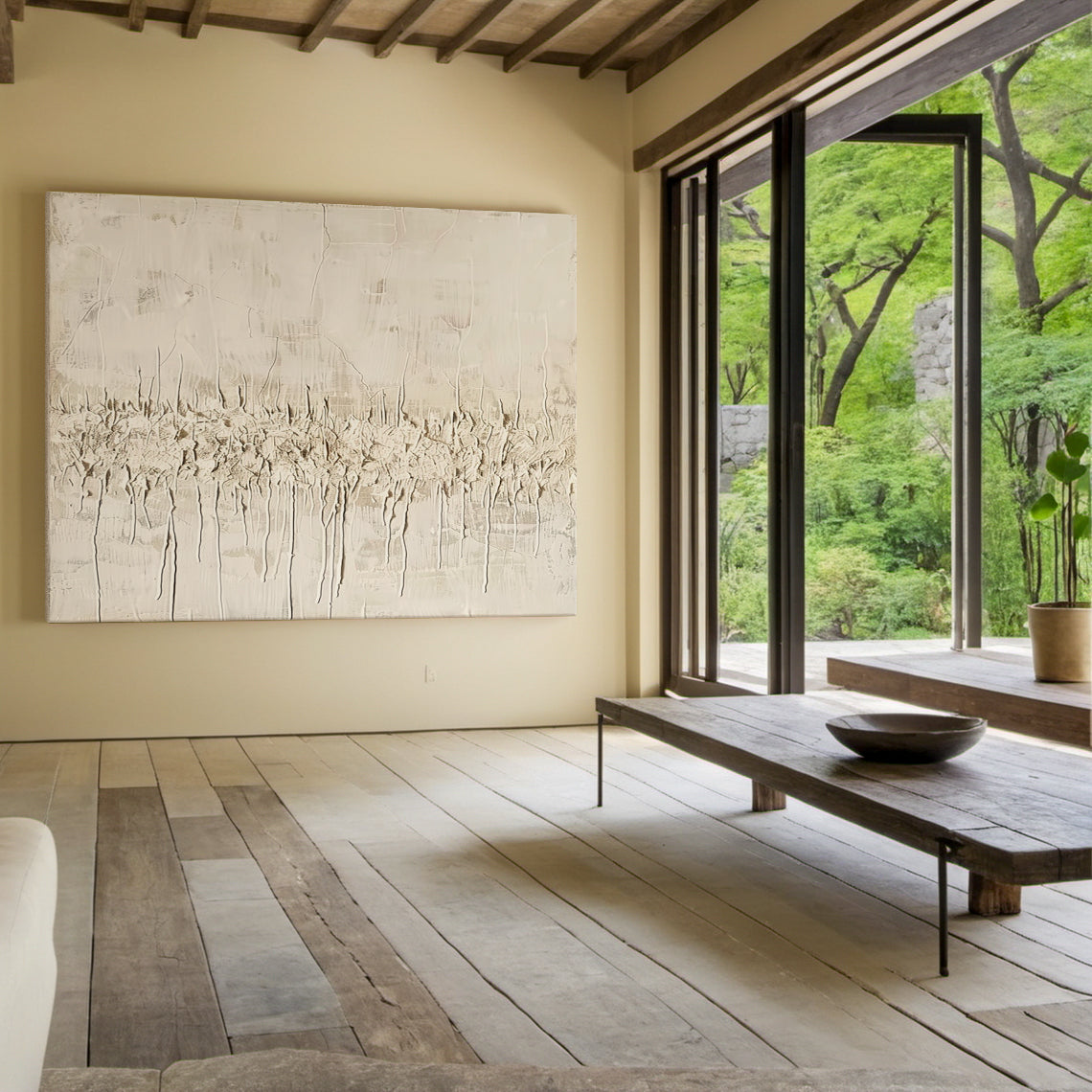 Vertical Wabi Sabi Abstract Art (AURA205) with 3D tactile plaster texture—thick impasto strokes, natural drips, and rough organic texture in neutral beige, off-white, and light brown tones. Displayed in a cozy bohemian bedroom with macramé wall hanging, rattan bed frame, and soft linen bedding, embodying the serene, organic Wabi Sabi aesthetics.