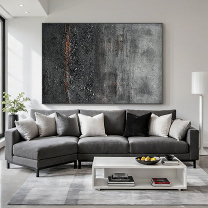 Wabi Sabi Abstract Impasto Canvas Art - Thick Tactile Charcoal Gray & Black Base with Soft Warm Terracotta Undertones. Displayed in a Serene Wabi-Sabi Bedroom Above a Natural Wood Bed Frame, Complementing Linen Bedding, Woven Pendant Light, and Minimalist Wooden Nightstand. Ideal for Calm Organic Bedrooms Seeking Timeless, Textured Wall Accents That Enhance Cozy, Earthy Ambiance.